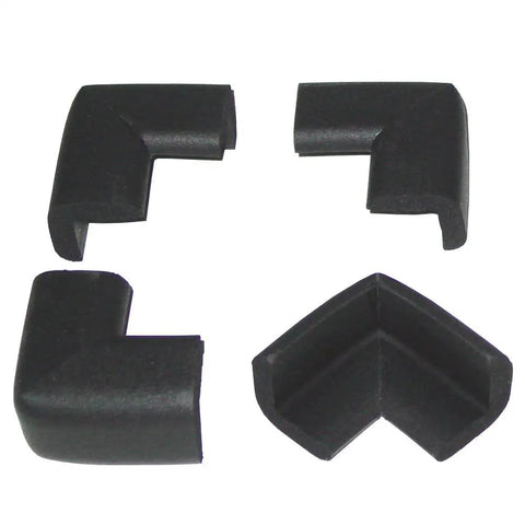 Four Piece Safety Corner Cushions For Baby And Home Protection With 3M Tape Easy To Install Made In USA BPA Free Latex Free Soft Yet Dense Foam Guard For Sharp Table Edges And Furniture, set of four black foam guards on white background.