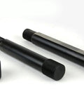 Components of the Double D Punch Die Set 1-3-8 by 1-1-8 Inch Knockout Hole Kit with Case, showing two tool steel dies and a threaded cap.