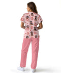 Back view of woman wearing pink Dachshund Print Scrubs Set For Women All Day Comfort Tops And Pants Multi Profession Nurse Uniform.