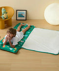 Child on Rollup Toddler Nap Mat With Removable Pillow And Minky Blanket Dinosaur Themed Sleeping Bag For Daycare Preschool Travel