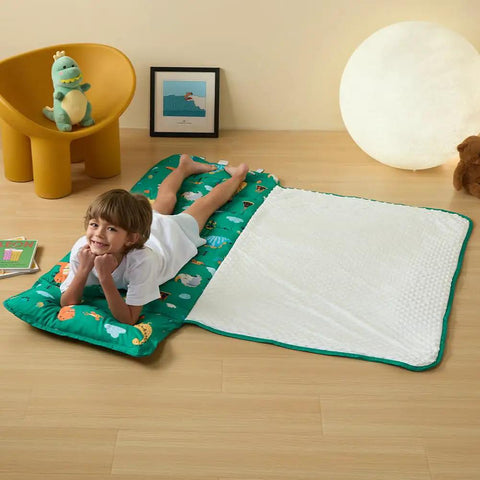 Child on Rollup Toddler Nap Mat With Removable Pillow And Minky Blanket Dinosaur Themed Sleeping Bag For Daycare Preschool Travel