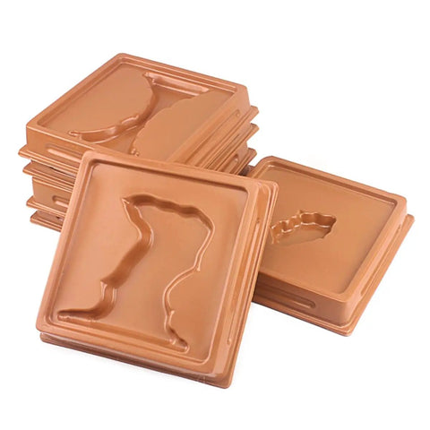 Stack of brown molds from Ten Piece Montessori Geography Learning Toy Set For Kids With Earth Science Molds For Land And Water Forms.