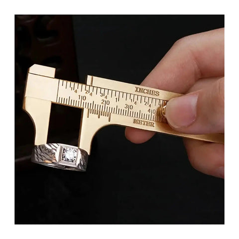 Solid Brass Digital Caliper High-Precision Mini Tool for DIY measuring a ring size with clear inch and meter scales.