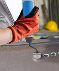 NG1000-BC1651 deburring tool with blue handle removing burrs from a metal sheet edge.