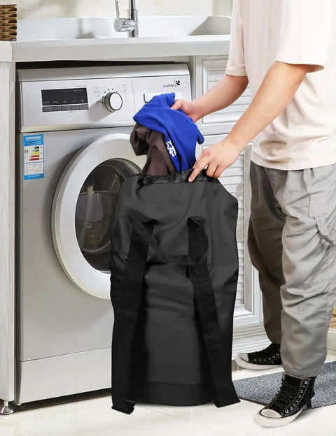 Person using Durable Nylon Laundry Backpack With Drawstring Closure near washing machine