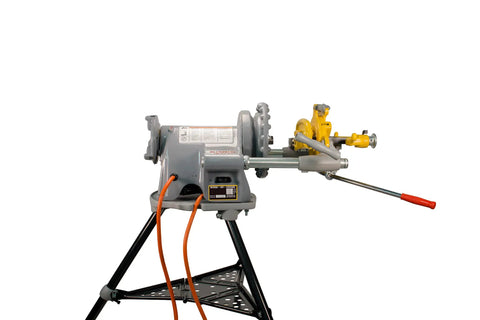 Reconditioned Heavy Duty Pipe Threading Machine With Foot Pedal And Quick Opening Die Head Handles half inch to two inch pipe on sturdy stand.