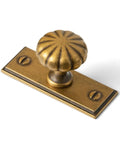 Top Notch Antique Brass Cabinet Knobs With Backplate Offering A Real Deal Plaquette Style For Drawers And Cupboards Pack Of Six Sturdy Kitchen Furniture Handles Delivering Serious Old Soul Charm. Close-up of an antique brass fluted dome cabinet knob with backplate.