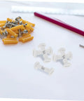 No Sweat Furniture Assembly Hardware 50 Piece Clamp Nut And Connecting Screw Kit components with yellow fasteners and white clamps.