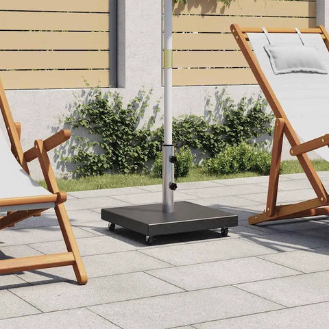 Rock Solid Parasol Base In Black Granite With Stainless Steel Construction Square Design on patio with chairs