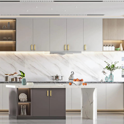 Modern kitchen with island, minimalist design, light gray cabinets, marble backsplash, integrated lighting, and decor elements.