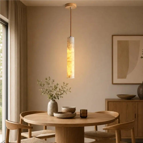 Alabaster Pendant Light Natural Marble Long Tube Hanging Lights with Wood Ceiling Canopy Modern Nordic Mini Pendant Lamp for Kitchen Island Bedroom Hallway(25 * 6cm) illuminating a dining table.