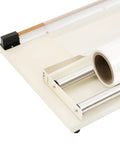 Top Tier 24 Inch Shrink Wrapping Station featuring a roll of plastic film and cutting bar setup for packaging.