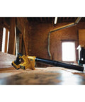 20V Max Cordless Leaf Blower With 100 CFM Airflow, 3 Speed Variable Switch, Trigger Lock on wooden surface in workshop
