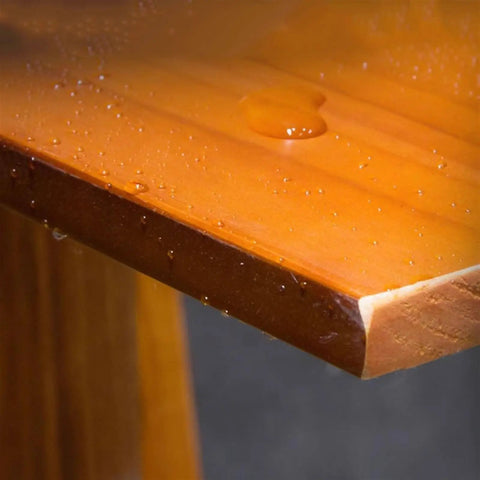 Close-up of solid wood shelf detail showcasing water beads on surface, part of Industrial Iron Pipe Wine Rack For Home Bar Flex.
