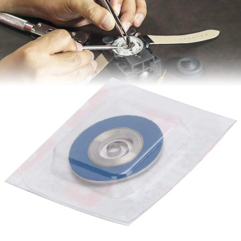Hands working with 2892 Mechanical Watch Movement Replacement For Repair, packaged blue-silver alloy component visible