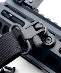 Tough As Nails Carbon Steel Rifle Sling Swivel Mount Heavy Duty Two Point Gun Sling Hardware with quick-release adapter close-up.