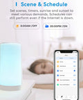 Smart Table Lamp With Touch Control, Tunable White And Multi Color Lighting, Works With Siri, Alexa, HomeKit And SmartThings on a bedside table with a smartphone app showing schedule settings, soft blue light illuminating.