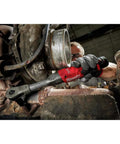 Heavy Duty Cordless Three Eighth Inch Extended Reach Ratchet With Badass 55 Foot Pounds Max Torque fitting in tight engine space.