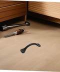 12 Piece Iron Cabinet Door Handles Retro Metal Drawer Pulls for Dressers and Farmhouse Cupboards on wooden floor