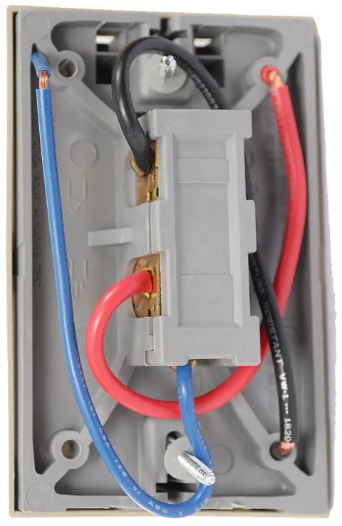Back view of T651A3018 Heat And Cool Thermostat For 120V To 277V Systems showing wiring connections and durable casing.