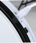 Close-up of the power connection on the Stunning White Motorized Rotating Display Stand With Mirror Finish Turntable.