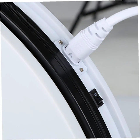 Close-up of the power connection on the Stunning White Motorized Rotating Display Stand With Mirror Finish Turntable.