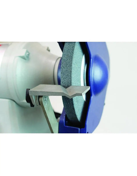 Close-up of the Killer 10 Inch Bench Grinder 1 HP Dual Voltage 115 230V sharpening a tool with its grinding wheel.