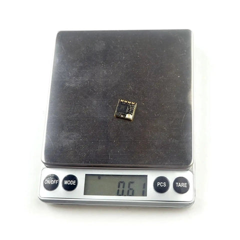 Long Range ELRS Transmitter And Receiver Kit For RC Planes And Drones 915/868 MHz component on digital scale showing weight