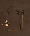 Adjustable Iron Wall Sconce With Smooth Glide Pulley Wheel And Clear Glass Shade For Soft Cozy Ceiling Lighting, bronze finish.