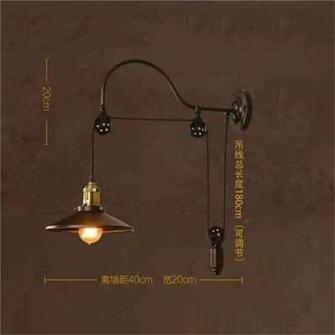 Adjustable Iron Wall Sconce With Smooth Glide Pulley Wheel And Clear Glass Shade For Soft Cozy Ceiling Lighting, bronze finish.