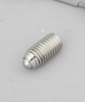 Close-up of a single screw from 20 Pack M10x20 Ball Point Set Screws, 304 Stainless Steel, Tough As Nails Hardware For CNC Machines.