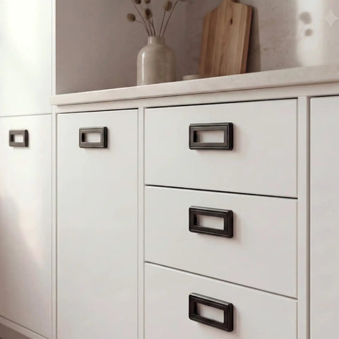 Hidden Furniture Handle Recessed Flush Door Pull Three Point Seven Five Inch Hole Center Matte Black on white cabinets