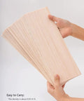 Hands holding Balsa Wood Sheets Bundle One Sixteenth Inch Thick 4 By 12 Inches Natural Unfinished Wood For DIY Crafts And Model Making