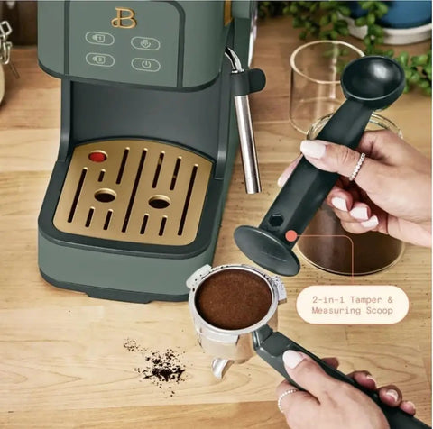Rock Solid Compact Espresso Machine In Fresh Thyme Green with portafilter and 2-in-1 tamper on wooden counter.