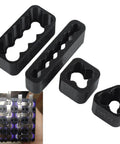 Hella Solid Welding Fixture Set With Precision Assembly Brackets For Diy And Pro Spot Welding Lithium Battery Pack Project Jigs And Multi Angle Clamps Tool Kit showing four black plastic brackets for precise lithium battery setups.