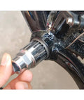 Hand using Beefed-Up 20 Tooth Bicycle Bottom Bracket Removal Tool For Cartridge BBs to remove Shimano Octalink ISIS BB