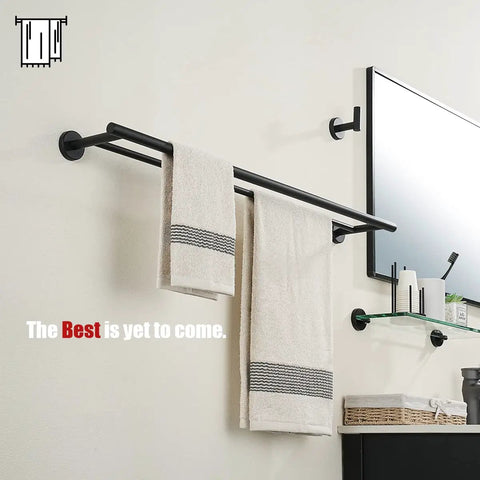 Double Bath Towel Bar Matte Black 33 Inch Stainless Steel Towel Rack With 0.8mm Thick Tube Rust Resistant 304 Grade Wall Mount Towel Holder Usable 30 Inch Length Easy Install No Fuss Quick Drying And Neat Towels with towels hanging on wall.
