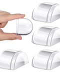 A hand holding a Heavy Duty Acrylic Door Stopper 4 Pack No Drill Sticky Wall Bumpers Smooth design with three additional bumpers.