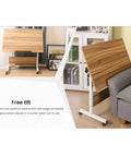 Adjustable Rolling Laptop Table With Slick Brake Wheels Easy Glide Mobile Workstation Desk For Bedroom Living Room Sofa Overbed Computer Desk setup in tilted position.