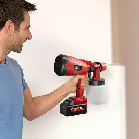 A person using a cordless paint sprayer featuring a powerful brushless motor and three adjustable patterns for flawless cabinet and fence finishing.