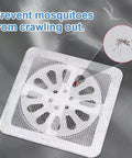 Ten Pack Square Disposable Shower Drain Hair Catcher Stickers on drain, measuring 3.94 inches, designed to prevent clogs.
