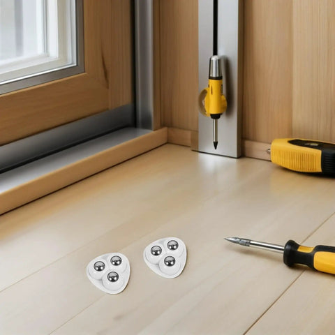Heavy Duty Triple Ball Swivel Casters With Grippy Adhesive Mounts Quick No Drill Install on a wooden desk with tools.