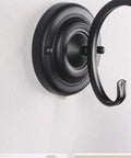 Close-up of Plug In Wall Sconce Lamp With E27 Base Metal Glass Shade showing black round metal mounting plate detail.