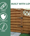 Wooden gate with Heavy Duty Black Cast Iron Pintle Strap Hinges Pack Of 30, 11.75 Inch Length, installed, highlighting durability.