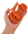 Universal EV Charging Port Cover Silicone Protector Waterproof Rain Shield For Electric Vehicles Tough As Nails Dustproof Outlet Seal Cap No Sweat Setup Season Safe Essentials in a hand showcasing orange silicone.