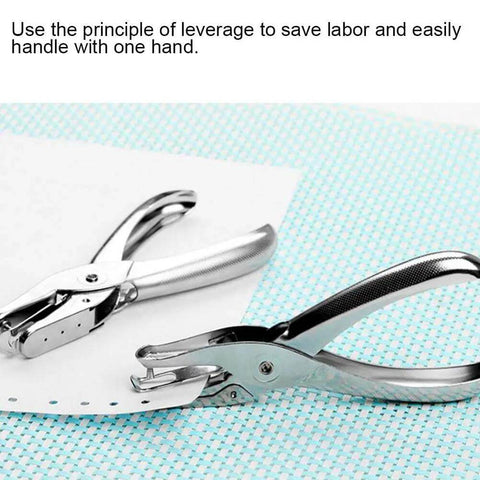 One Handed Hole Punch For Paper, 6 Sheet Capacity, 3.175mm Hole, Chrome Plated Handheld Puncher on paper, shown close-up
