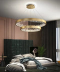 Modern K9 Crystal Chandelier, Dimmable LED Ceiling Pendant Light, Gold Circle Hanging Lamp in elegant bedroom setting.