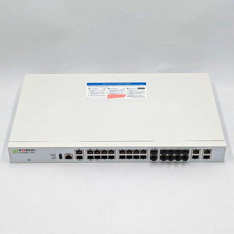 Next Generation Firewall Providing Rock Solid Enterprise Network Security And Top Notch Secure Gateway Protection Via 10GbE Fiber Ports For Heavy Duty Wired Business Networks, white chassis with multiple ports.