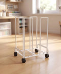 Game Changer Mobile Storage Cart And Roll Right Through Box Holder Rack Built With Slick Gliding Casters in a bright office.