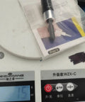 Windshield Repair Kit For Chips And Cracks, DIY Glass Filler For Automotive Glass on a digital scale showing 15 grams